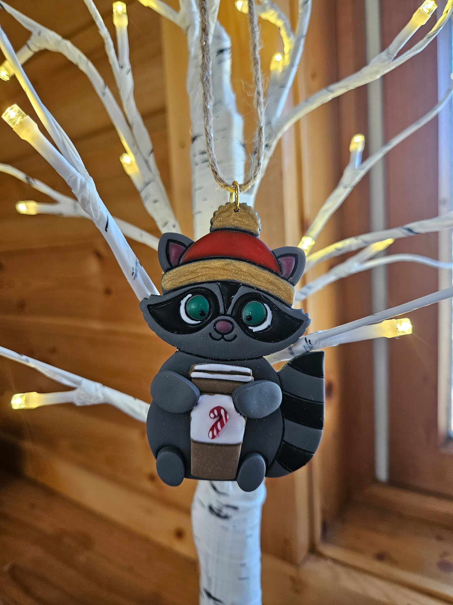 Snowy Snuggles Racoon